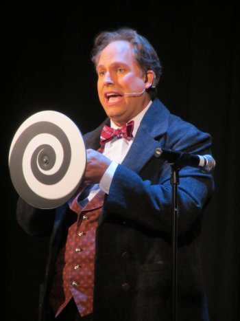 Host for the Gala, magician Andrew Pinard, mesmerizes the audience with a rotating wheel.