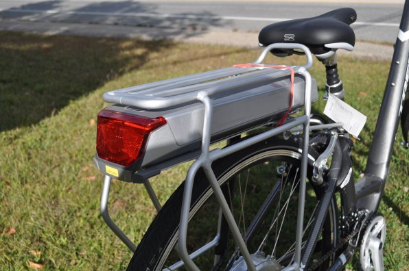 That isn’t a place to carry pizza – it’s the battery pack in the electric assist bike.