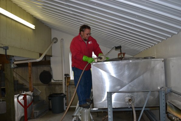 Souther checks the tank connection cause you wouldn’t want to waste good cider, now would you?
