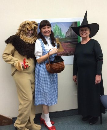 Carol Bouchard as the Cowardly Lion, Robbin Bailey as Dorothy and Pam Stauffacher as the witch.