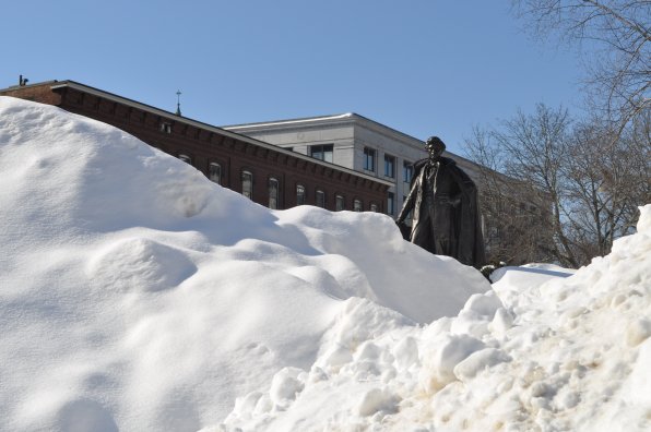 1. Here we see one of New Hampshire’s celebrated statuefied figures, climbing from the depths of the mounting snow pile (previous photo) to conquer the mountain and claim his rightful throne as king of the bronzy snow guys. Frankly, we’re not surprised he was able to pierce the snow with his stony self.