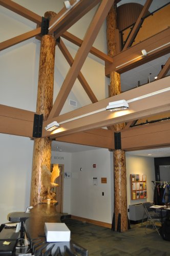 <strong>N.H. Audubon's McLane Center</strong></p><p>The McLane Center added a 12,000-square foot addition that is a Gold Level LEED certified building, with a ton of cool energy efficient touches. The posts used in the building’s lobby are from white pines that were cut down to make space for the parking lot, and Audubon employees stripped the bark (they are also protected by water-based, low-emission polyurethane). 