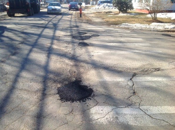 Since this story is all about potholes, we thought it would be a good idea to show a before and after picture. Now it’s up to you to figure out which one this is.