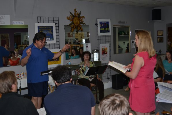 Music director Carlos Martinez and artistic director Jane Cormier work with the cast at their studios on North Main Street.