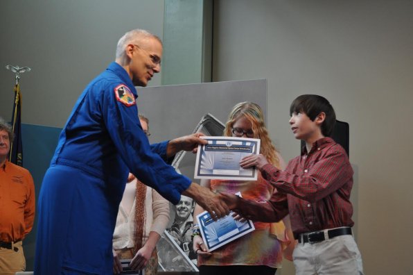 Astronaut Lee M. Morin lets Jack Rogers know he’s going to space camp.