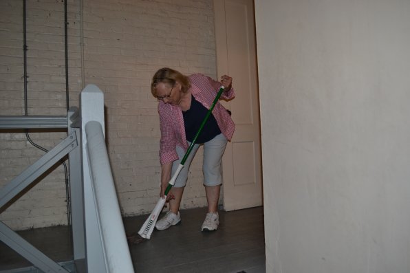 Carrie Hunt took care of some much needed mopping of the third floor staircase.