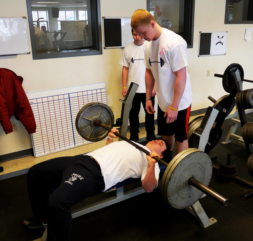 Merrimack Valley senior Hunter Darling bench presses under the watchful eye of spotter Ryan Hoar at the Benchathon Darling ran March 16 to raise money to fight breast cancer. Darling had raised $838 by last Friday and expected the total to exceed $1,000 before all was said and done. The highest bench press total of the day was achieved by school guidance counselor Mark Ciarametaro, who reached 285 pounds, while Hoar had the highest student mark at 250. “I was really excited. Everyone who went really had a good time,” Darling said. “And we raised a lot of money. My goal was about $500, so to get over $1,000 is great.”