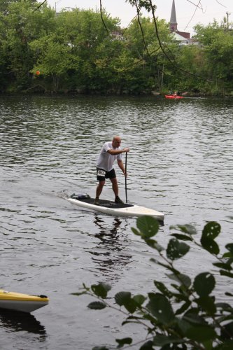 If you enter the New England Run Paddle Biathlon Championship that could be you stand-up paddle boarding around the Merrimack River.