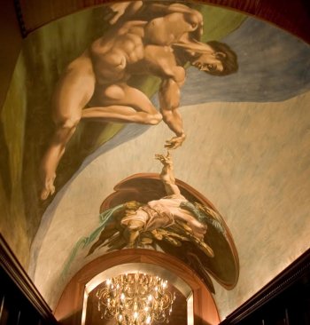 Pothier has also done many commission paintings of famous works of art, like this mural of Michaelangelo’s ‘Creation of Man.'