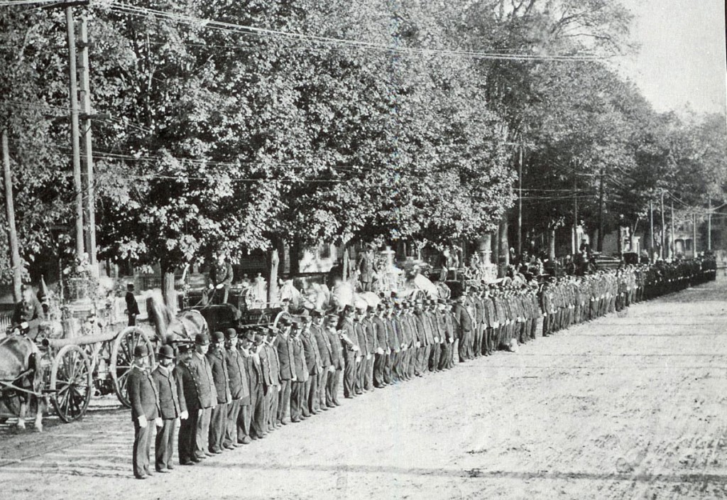 We wonder if the members of the Concord Fire Department are as good at standing in a perfectly straight line today as they were in 1894, when this photo of the Fireman’s Parade was taken. Yes, those are steam engines in the background, as noted by reader Earl Burroughs, who submitted the photo. And yes, those are super awesome hats the firemen are wearing.