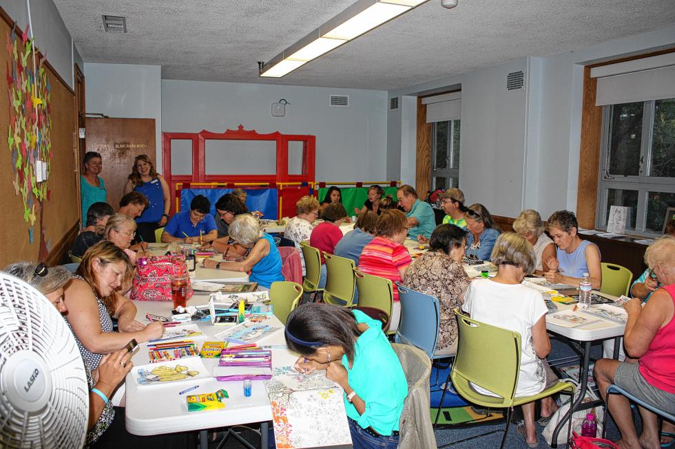 The Blanchard Room at the Concord Library was absolutely packed with adult coloring enthusiasts. Library officials counted 35 in total over the course of the evening.  (JON BODELL / Insider staff) - 