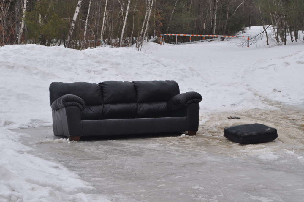 Potential Craigslist advertisement: “Apartment for rent, partially furnished. Heat, hot water, walls and other structural elements not included. Spacious living room with year-round breezes offers plenty of room to entertain.” We haven’t found that actual listing yet, but we did find this couch just chillin’ on the side of Sewalls Falls Road. It wasn’t clear if some rent-wary tenant was in the process of creating a revolutionary free living space (live free or die, man) or the couch was simply free to a good home. It’s also possible the couch started the day at the edge of the road and took a ride down that enormous sheet of ice. Either way, this new property looks perfect for those who have always wanted to find a nice place in the woods.