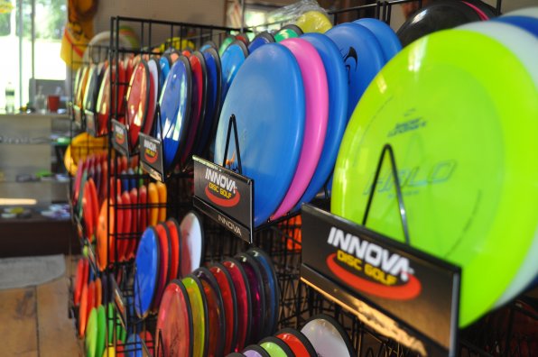 Discs, which are a fairly important part of disc golf. You can get everything you need in the Top O’ The Hill pro shop.