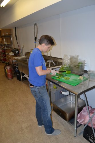 Dos Amigos manager Amanda Hackett doesn’t mind cutting up a few vegetables, especially when she can do it in the luxurious new downstairs kitchen area the burrito chain recently put the finishing touches on.