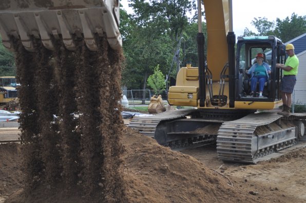 Got a major construction project you need help with? Call Mary Chagnon . . . she has 15 minutes of excavator experience under her belt. In fact, we wouldn’t be surprised to find her working with the Cobb Hill Construction crew at Havenwood before the summer’s out.