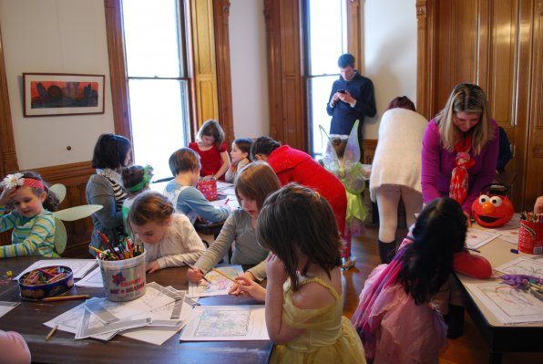The fairies and princesses at the fairy tea party get down to business on their art projects.