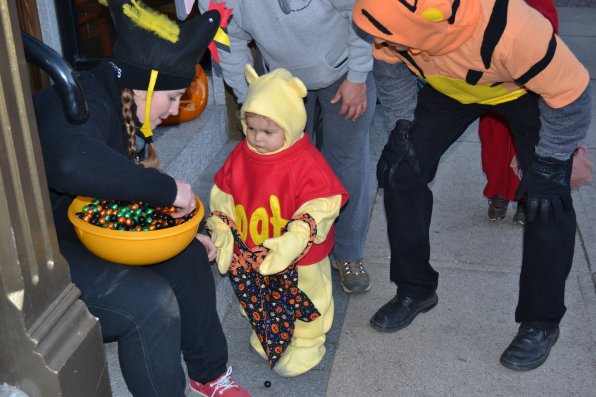 Lily Morris, 2, (aka Pooh) has to settle for some candy instead of a more preferred pot of honey.