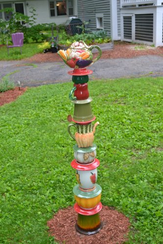 Happy Returns whimsical recycled garden art.