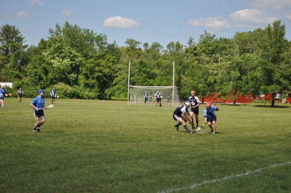 The Barley House Wolves had their hurling home opener at Amoskeag Beverages in Bow on Saturday afternoon, and hurl they did! They defeated a visiting team from Hartford, and if we understood how the scoring went in hurling, we’d totally put the final score here. It was a perfect day for some good action, though, and there was plenty of opening-day pageantry – the teams walked onto the field to the sound of bagpipes and the first ball was thrown out by Mayor Jim Bouley.