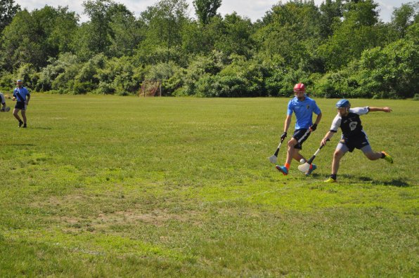 The Barley House Wolves had their hurling home opener at Amoskeag Beverages in Bow on Saturday afternoon, and hurl they did! They defeated a visiting team from Hartford, and if we understood how the scoring went in hurling, we’d totally put the final score here. It was a perfect day for some good action, though, and there was plenty of opening-day pageantry – the teams walked onto the field to the sound of bagpipes and the first ball was thrown out by Mayor Jim Bouley.