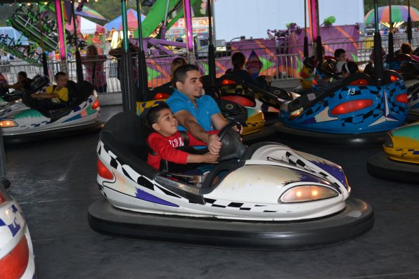 It takes four hands to drive this bumper car when Emerson and Luan Figueiredo get behind the wheel.