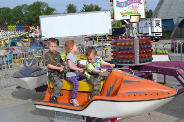 These three kids, Jackson Higgins, Zoey Higgins and Remington Robinette, sure did enjoy the Wave Runner ride at the Kiwanis Spring Fair last Friday