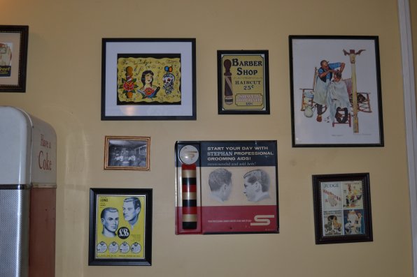 No barbershop is complete without old stuff on the wall.