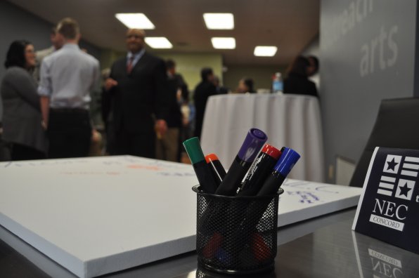 The path to a rich education is paved with bright Sharpie markers. Or something. These markers were in attendance at the opening ceremony for New England College’s new Concord location.