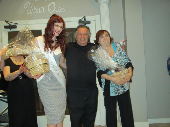 The ladies after the reveal, flanking salon owner Peter Kapos.