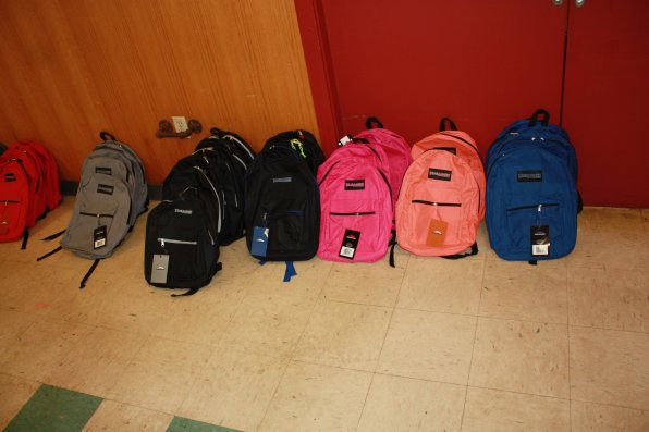 Some of the backpacks that had yet to be picked up shortly after the doors opened.