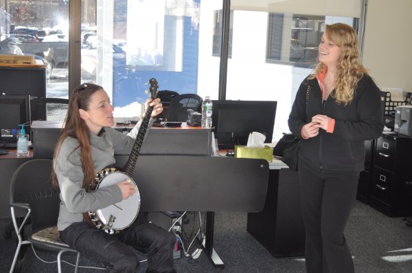 What better way to pass the time while your car is inspected than with an impromptu banjo serenade from Amanda Grappone.