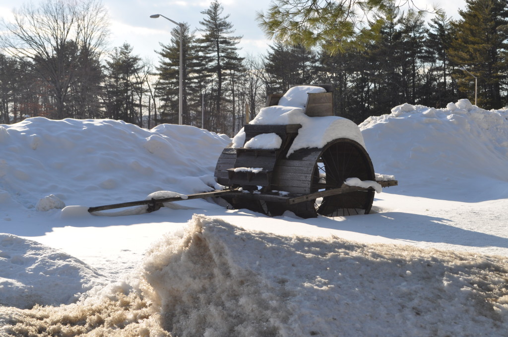 We were going to include this in our snowbank scavenger hunt a few weeks ago, but never got around to it. Still, that’s a pretty cool whatever that is. We’d have hopped up there to take a ride around Concord, old-school style, but there’s never a team of oxen around when you need it.