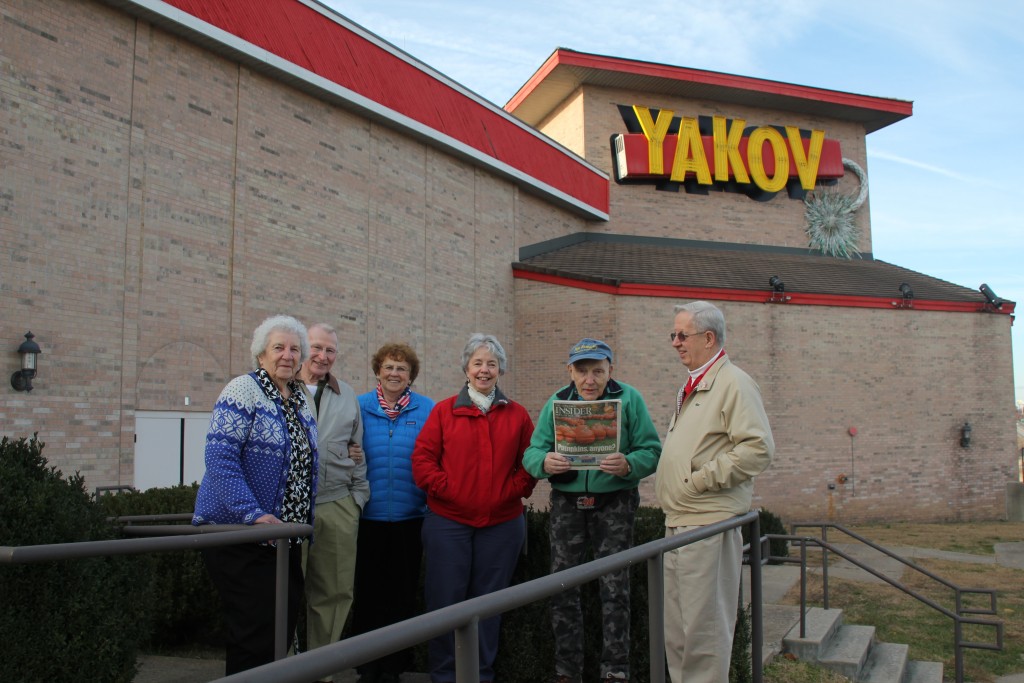 We like to think Yakov Smirnoff would be a fan of the Insider if he were still alive today. Wait, he is alive? Anyway, here we see Tina Fife, Jim Timmins, Maureen Timmins, Terry Banfill, Danny Webster (holding the paper) and Howard Banfill outside the Yakov Smirnoff Theater in Branson, Mo. Now if you’ll excuse us, we have to go remove a piece of erroneous information we’ve left on Smirnoff’s Wikipedia page.