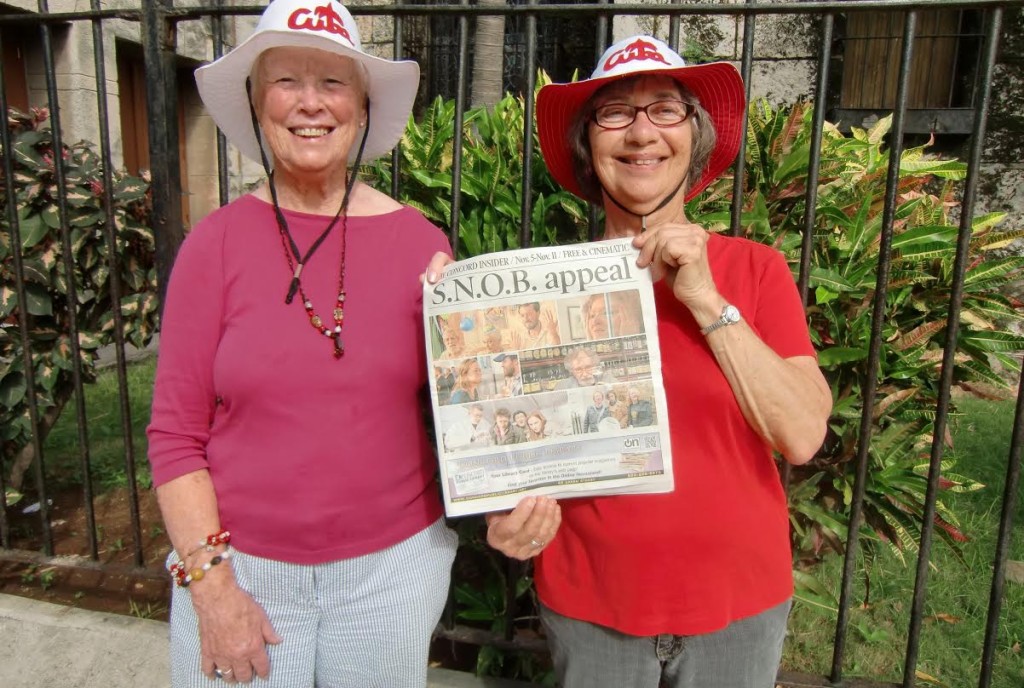 This photo and note came to us from Sylvia Miskoe: “You can’t get there from here, but Sylvia Miskoe and Brenda Sens managed to get to Havana, Cuba, earlier in November. Here we are in front of a 400-year-old wall in the old section of the city.” Don’t worry, wall, you don’t look a day over 385. Also, sweet hats, ladies!