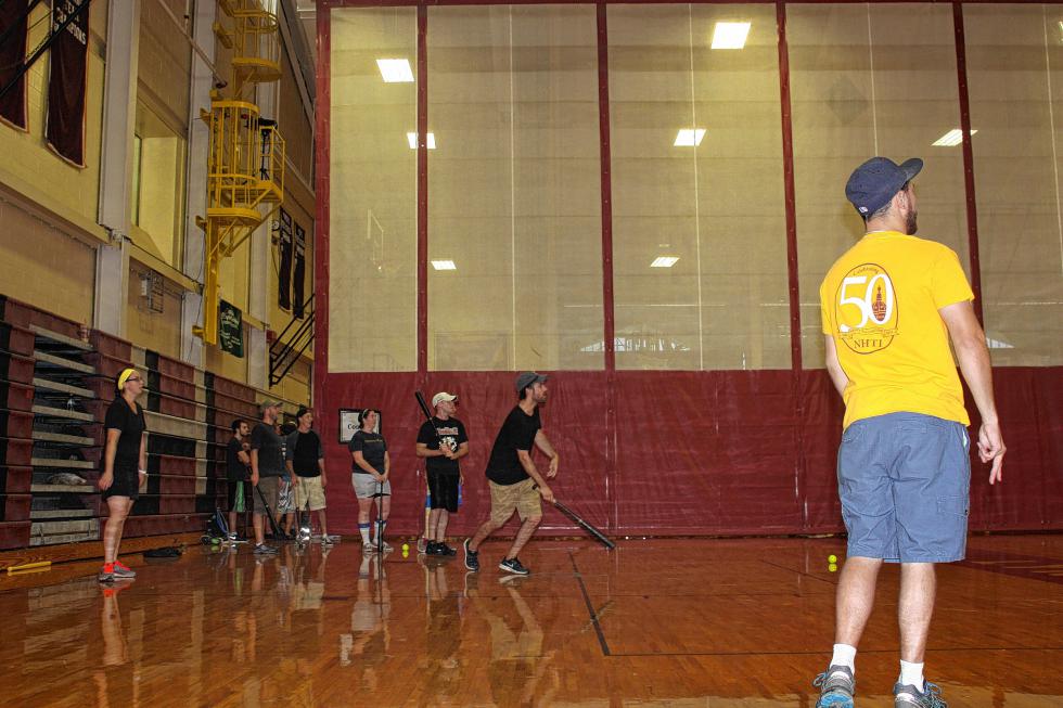 Jon follows through on a home run swing in the Monitor's first tournament game. (AIMEE LAROCHELLE / For the Insider) -