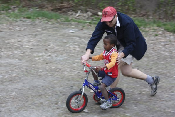 Dan Gorenstein helps son Khalil, 3, on his first training-wheels-free bike ride.