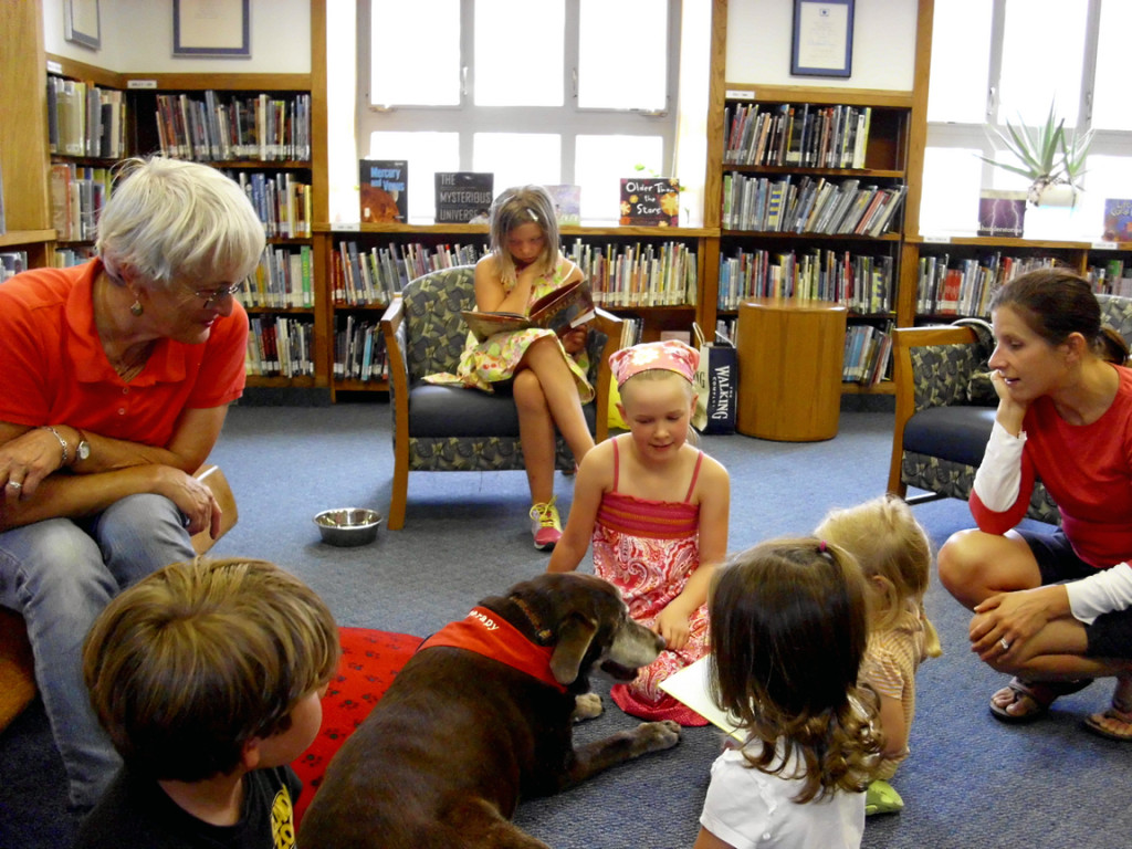 Therapy dog Lily is the star of the Concord Public Library’s Paws For Pages program – and last week was her 14th birthday! Paws for Pages attendees brought her gifts.