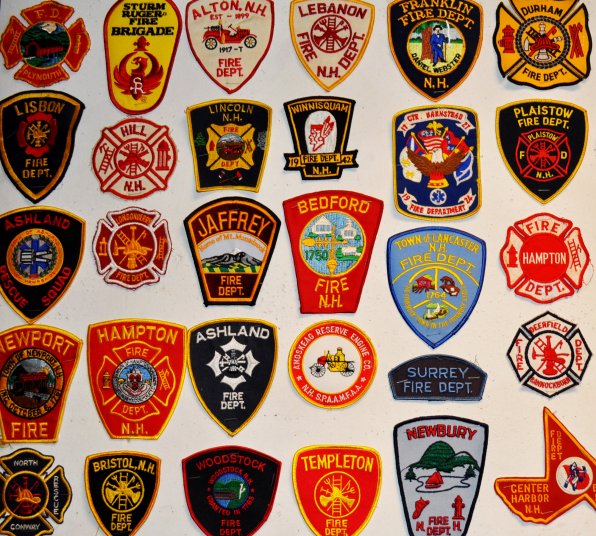 Broadway firemen swap patches with other stations around the country.