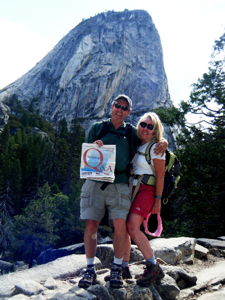 Roy Weddleton and Susanne Smith Meyer took a trip to Yosemite National Park – and they took the <em>Insider</em> with them! Here they are in front of Half Dome.