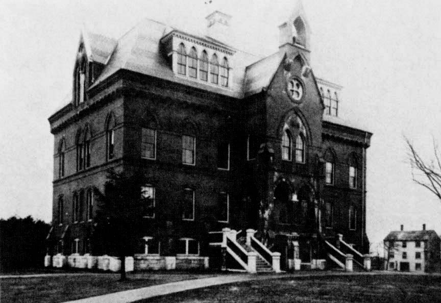 We warned you that last week’s classic Concord photo was going to be a tough one, but even we didn’t know how tough it would be. Turns out, the photo (which we saw at Depot Antique & Toys) was mislabeled – that building isn’t even in Concord! Eagle-eyed reader (and former Concord resident) Dan Cleveland recognized it right away. Cleveland told us he was on the Concord High School chess team (class of ‘66!) and that, as the best public high school chess team in New England, they often found themselves travelling to various prep schools for matches. One such school was Phillips Academy in Andover, Mass. – home of the building seen above, which was called the Fifth Main Academy Building. Good work, Dan! Check back next week for another classic photo.