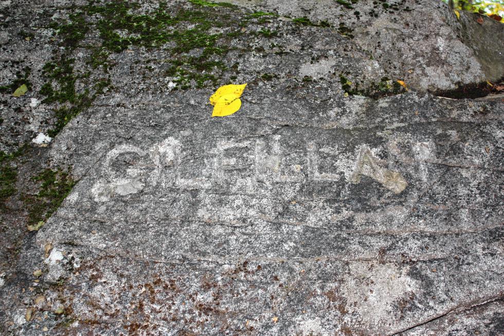 Gilfillan Rock, a fixture at Marjory Swope Park. The name Gilfillan is carved into the rock. (JON BODELL / Insider staff) - 
