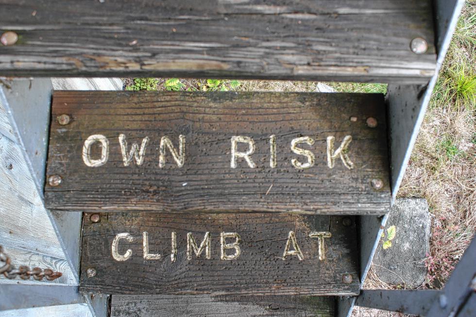 Perhaps the most foreboding thing you'll see on any of Concord's trails is this message on the stairs leading up to the top of the fire lookout tower at Oak Hill. I acknowledged the message and courageously proceeded up the steps. (JON BODELL / Insider staff) -
