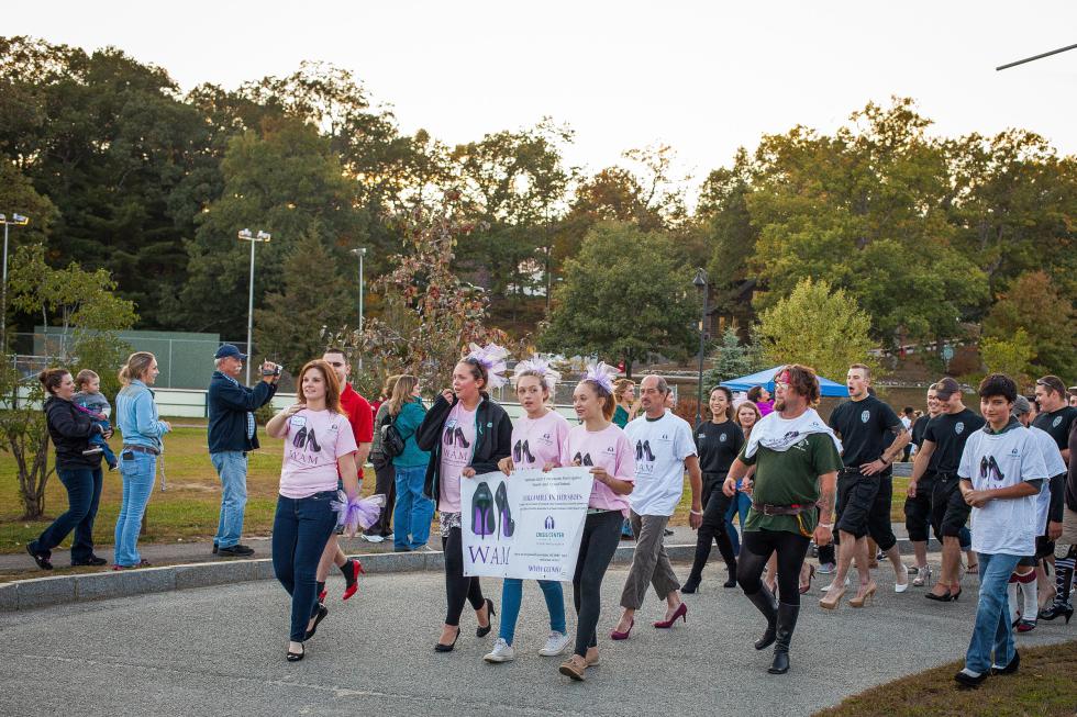 Volunteers lead the way at the start of the walk.  (ELIZABETH FRANTZ / Monitor staff) - ELIZABETH FRANTZ | Concord Monitor
