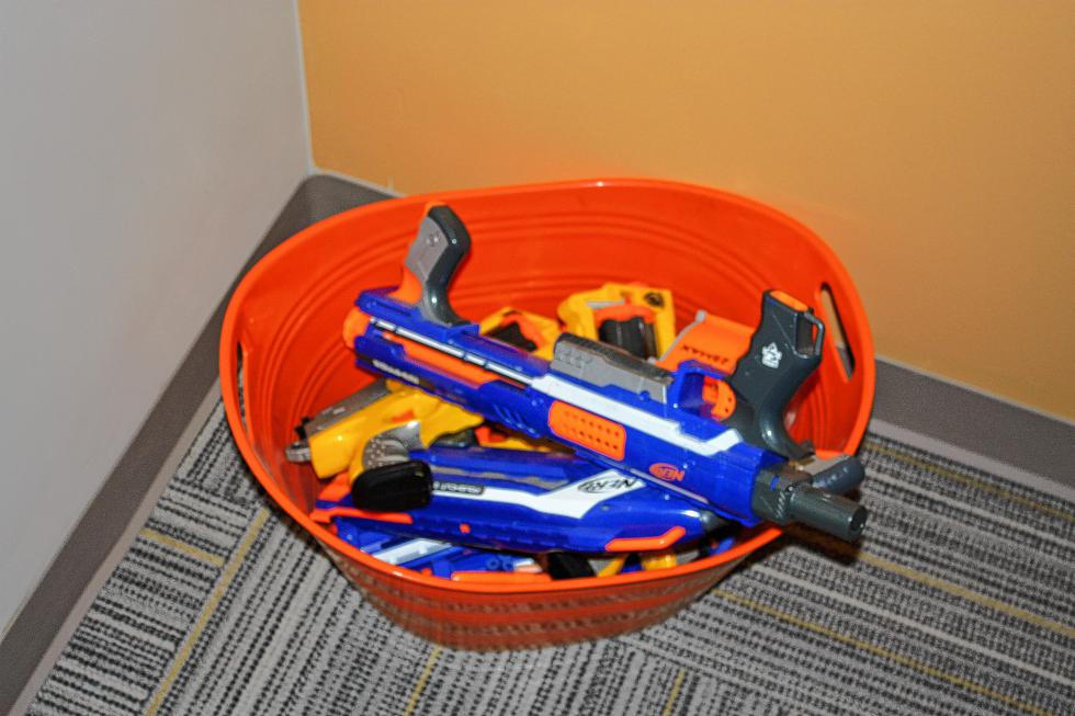 Just in case you feel the need to shoot someone in the face - with a foam dart - while you work. Every office should have a bucket of Nerf guns. (JON BODELL / Insider staff) - 

