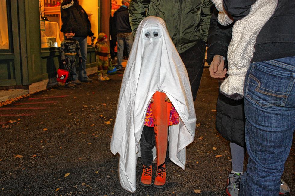 Charlotte Willing, 4, went with the classic ghost costume. You really don’t see many ghosts nowadays, so it’s good to know there are still some old-school Halloween purists left in the world. (JON BODELL / Insider staff) - 
