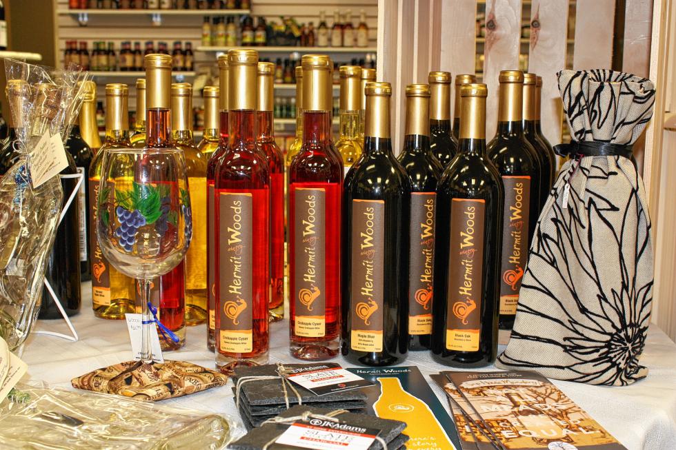 Hermit Woods wine from Meredith comes in flavors such as Crabapple Cyser (honey crabapple), Maple Blue (blueberry and maple) and Black Oak (blackberry). Marketplace New England has plenty in stock. (JON BODELL / Insider staff) - 
