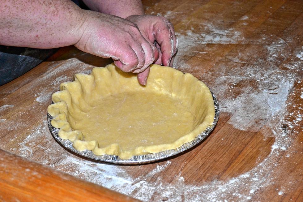 That’s called crimping in the baking world. (TIM GOODWIN / Insider staff) - 
