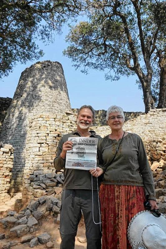 Concord residents David and Lindy Keller took the long trip to Zimbabwe in August with a delegation from the New Hampshire Conference of the United Church of Christ and were kind enough to bring a copy of the “Insider” with them. While in Zimbabwe, they visited the Great Zimbabwe Ruins, a UNESCO World Heritage site built and occupied between the 13th and 15th centuries, which is the largest ruin in sub-Saharan Africa. It’s only appropriate that they brought along the “Insider” that had to do with photography, and it sure does seem like they took a long look at the instructions on the cover. (Courtesy photo) - 
