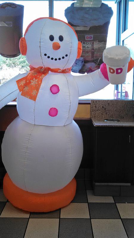 The Dunkin' Donuts on Manchester Street features this friendly greeter inside. (JON BODELL / Insider staff) - 
