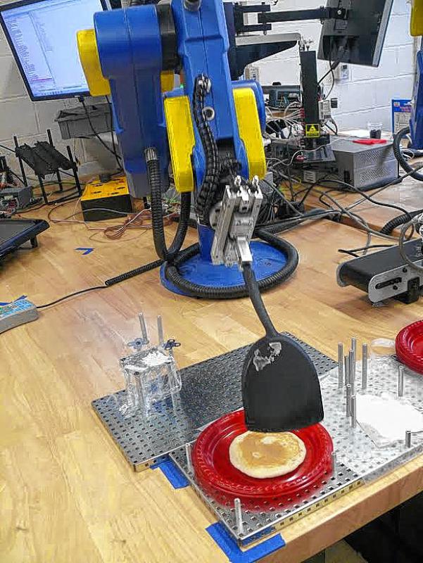 Not only did the robots make pancakes, but they also served them. (Courtesy photo) - 
